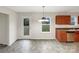 Bright dining area with stylish light fixture, and a door leading to the backyard at 845 Finley Rd, Rock Hill, SC 29730