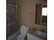 Bathroom featuring a toilet, vanity, and tub with a mermaid-themed shower curtain at 9129 Troon Ln # C, Charlotte, NC 28214