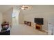 Bonus room featuring natural light, a desk, a television, and open floor plan at 100 Cliveden Ct, Belmont, NC 28012