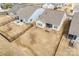 Aerial view of the backyard with a manicured lawn and outdoor patio at 10014 Berkeley Castle Dr, Charlotte, NC 28273