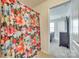 Full bathroom showing a shower curtain and a partial view into a bedroom space at 10014 Berkeley Castle Dr, Charlotte, NC 28273