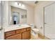 Clean and bright bathroom with vanity sink, toilet, and neutral finishes at 10014 Berkeley Castle Dr, Charlotte, NC 28273