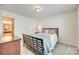 Cozy bedroom with a comfortable bed, soft bedding, and plenty of natural light at 10014 Berkeley Castle Dr, Charlotte, NC 28273