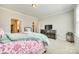 Spacious bedroom with a plush bed, a large dresser, and a TV for ultimate comfort and relaxation at 10014 Berkeley Castle Dr, Charlotte, NC 28273