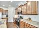 Well-equipped kitchen featuring granite countertops, stainless steel appliances, and ample cabinet space at 10014 Berkeley Castle Dr, Charlotte, NC 28273