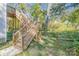 Backyard features a raised deck with stairs and a fence enclosing a grassy area at 1006 W B St, Kannapolis, NC 28081