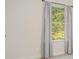 Bright bedroom featuring a window with curtains and neutral wall paint at 1006 W B St, Kannapolis, NC 28081
