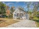Charming one-story home showcasing a covered porch, driveway, and well-kept landscaping at 1006 W B St, Kannapolis, NC 28081