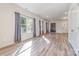 Neutral living room with vinyl floors, neutral walls, and lots of natural light at 1006 W B St, Kannapolis, NC 28081