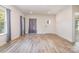 Neutral living room with vinyl floors, neutral walls, and lots of natural light at 1006 W B St, Kannapolis, NC 28081