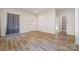 Neutral living room with vinyl floors, neutral walls, and lots of natural light at 1006 W B St, Kannapolis, NC 28081