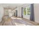 Bright, open-concept living space with hardwood floors adjacent to the kitchen at 1006 W B St, Kannapolis, NC 28081
