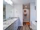 Bright bathroom features a granite vanity with ample cabinet storage and a shower at 108 Oak Grove St, Kannapolis, NC 28081