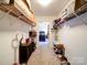 Spacious walk-in closet with ample shelving and rod space, leading into the bedroom at 108 Oak Grove St, Kannapolis, NC 28081