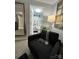 Inviting bedroom featuring a cozy reading nook and an ensuite bathroom, enhanced by stylish décor at 109 Stroupe Rd # E, Gastonia, NC 28056