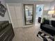 Spacious bedroom with closet space, a decorative mirror, and an ensuite bathroom at 109 Stroupe Rd # E, Gastonia, NC 28056