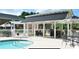 Beautiful community pool area with shaded seating, perfect for relaxation at 109 Stroupe Rd # E, Gastonia, NC 28056