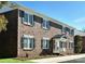 Charming brick exterior with classic windows and a welcoming front porch at 109 Stroupe Rd # E, Gastonia, NC 28056