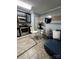 Eat-in kitchen with stainless steel appliances and modern finishes open to living area at 109 Stroupe Rd # E, Gastonia, NC 28056