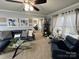 Well-lit living room boasts modern furnishings, decorative wall art, and a welcoming atmosphere at 109 Stroupe Rd # E, Gastonia, NC 28056