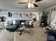 Bright living room featuring a modern sectional, glass table, and ample space for comfortable living at 109 Stroupe Rd # E, Gastonia, NC 28056