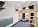 bedroom with a wooden loft bed, hardwood floors, and natural lighting at 11001 Valley Spring Dr, Charlotte, NC 28277