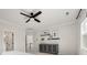 Bedroom with hardwood-style floors and decorative wall shelves above a wooden cabinet at 11001 Valley Spring Dr, Charlotte, NC 28277