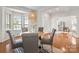 Inviting dining room with modern lighting, views into a study, and a bright atmosphere at 11001 Valley Spring Dr, Charlotte, NC 28277