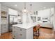 Large kitchen features a big center island, stainless steel appliances, and a spacious layout at 11001 Valley Spring Dr, Charlotte, NC 28277