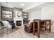 Cozy living room featuring a fireplace, built-in shelves, and stylish furniture, perfect for relaxation and entertaining at 11001 Valley Spring Dr, Charlotte, NC 28277