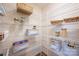 Organized pantry with wire shelving and storage baskets for food and household items at 11001 Valley Spring Dr, Charlotte, NC 28277