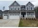 Charming two-story home featuring a classic design and well-manicured landscaping at 12027 Mariners Cove Ct # 381, Lancaster, SC 29720