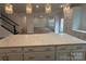 Stylish kitchen island featuring quartz countertops and ample cabinet space at 12027 Mariners Cove Ct # 381, Lancaster, SC 29720