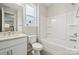 Modern bathroom with granite countertops and bathtub shower at 177 Glenn Dr, Mooresville, NC 28115
