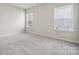 Comfortable bedroom featuring soft carpet and two windows providing natural light at 177 Glenn Dr, Mooresville, NC 28115