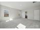 Main bedroom with neutral walls, two windows, and carpeted floors at 177 Glenn Dr, Mooresville, NC 28115