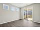 Bright sunroom with a sliding glass door that leads to an outdoor porch and scenic views at 177 Glenn Dr, Mooresville, NC 28115