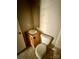 Small bathroom featuring a single sink vanity, toilet and a plain mirror at 191 Ashford Dr, Olin, NC 28660
