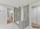 Modern bathroom boasts an elegant walk-in shower with beautiful tile and glass enclosure at 19419 Youngblood W Rd # 2, Charlotte, NC 28278
