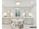 Bright bathroom features a soaking tub, double sink vanities, and modern fixtures at 19419 Youngblood W Rd # 2, Charlotte, NC 28278