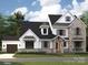 Charming two-story home boasts a stone and stucco facade, complemented by a dark roof and lush landscaping at 19419 Youngblood W Rd # 2, Charlotte, NC 28278