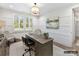 Bright office space has natural light and a large desk, creating a perfect work environment at 19419 Youngblood W Rd # 2, Charlotte, NC 28278
