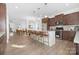 Bright, open kitchen with an island, pendant lighting, and stainless steel appliances at 25966 Appleyard Ct # 1205, Lancaster, SC 29720