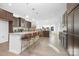 Spacious kitchen featuring a large island with seating, stainless appliances, and modern finishes at 25966 Appleyard Ct # 1205, Lancaster, SC 29720