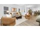 Bright living room with modern furniture and open floor plan with a view to the kitchen at 25966 Appleyard Ct # 1205, Lancaster, SC 29720