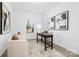 Bright office space with a desk, comfortable seating, and a view to the outdoors at 25966 Appleyard Ct # 1205, Lancaster, SC 29720
