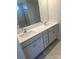 Bathroom featuring double sink vanity with modern fixtures and granite countertops at 2616 Tillman St, Monroe, NC 28112