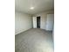 Neutral bedroom with large walk-in closet and plush carpet at 2616 Tillman St, Monroe, NC 28112
