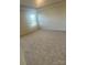 Spacious main bedroom featuring neutral carpeting and tray ceiling at 2616 Tillman St, Monroe, NC 28112