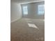 Spacious main bedroom with neutral carpeting and ample natural light at 2616 Tillman St, Monroe, NC 28112